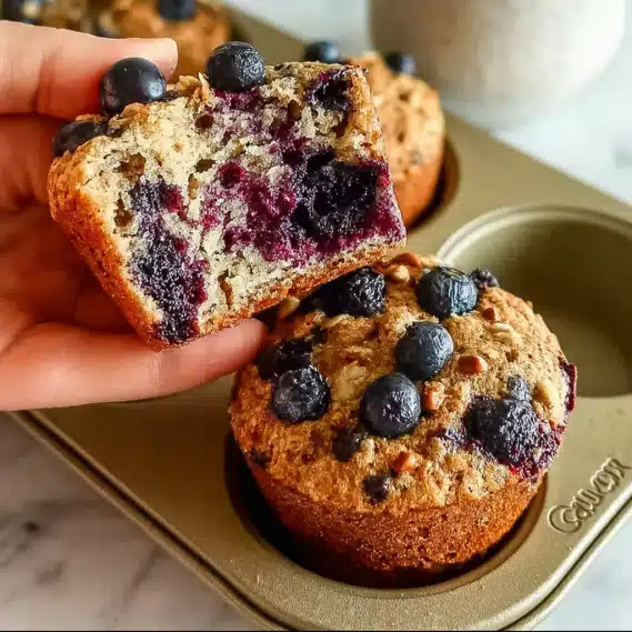 Blueberry Cottage Cheese Muffins – Easy, Moist & High-Protein 5 blueberry cottage cheese muffins ready to eat
