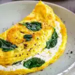 Cottage Cheese Omelette: Easy, Creamy & High Protein Breakfast Recipe 5 Cottage Cheese Omelette on plate with chives