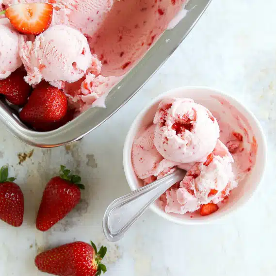 Strawberry Cottage Cheese Ice Cream: Healthy No-Churn Treat Everyone Loves 4 Strawberry cottage cheese ice cream served with toppings in a bowl