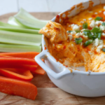 Cottage Cheese Buffalo Chicken Dip (High-Protein, No Cream Cheese!) 5 Cottage cheese buffalo chicken dip served warm with celery and chips