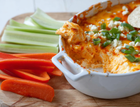 Cottage Cheese Buffalo Chicken Dip (High-Protein, No Cream Cheese!) 4 Cottage cheese buffalo chicken dip served warm with celery and chips