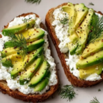 Cottage cheese avocado toast on sourdough with dill and chili flakes