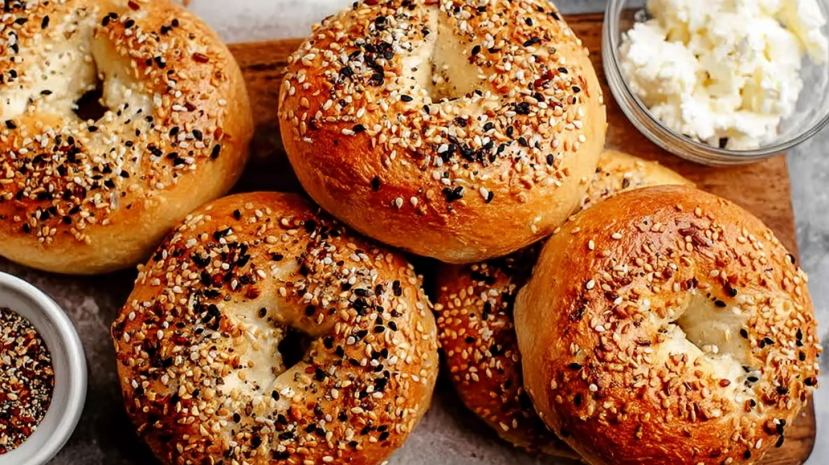 Cottage cheese bagels cooling on wire rack in rustic kitchen