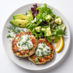 Cottage Cheese Chicken Patties – 5-Star Healthy Dinner 5 Cottage Cheese Chicken Patties topped with avocado and aioli on a plate